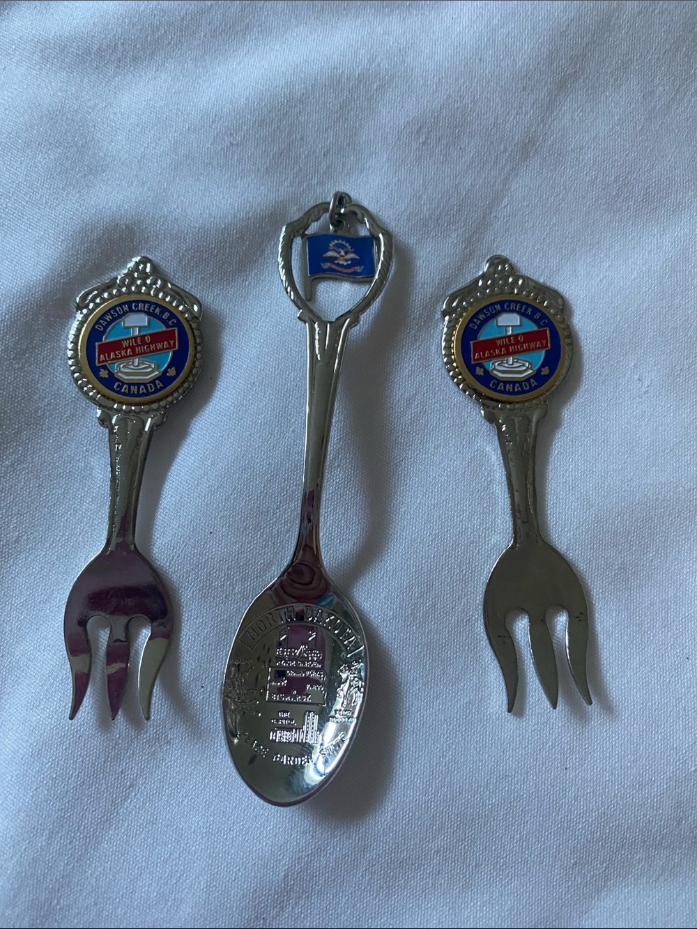 2 Canada Souvenir Alaska Highway Spoon and North Dakota spoon